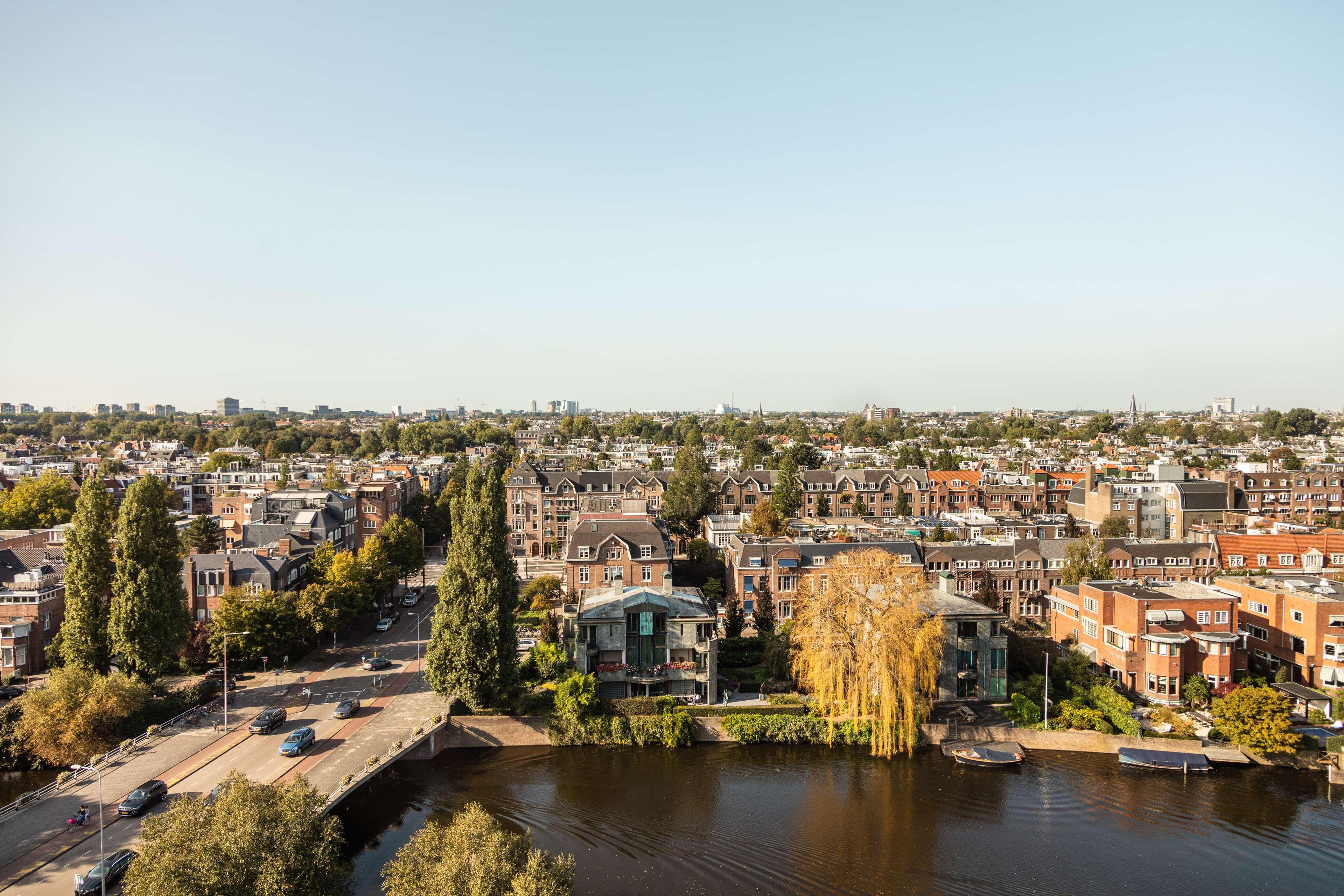 Hilton Amsterdam Hotel Exterior photo Aerial view of the town